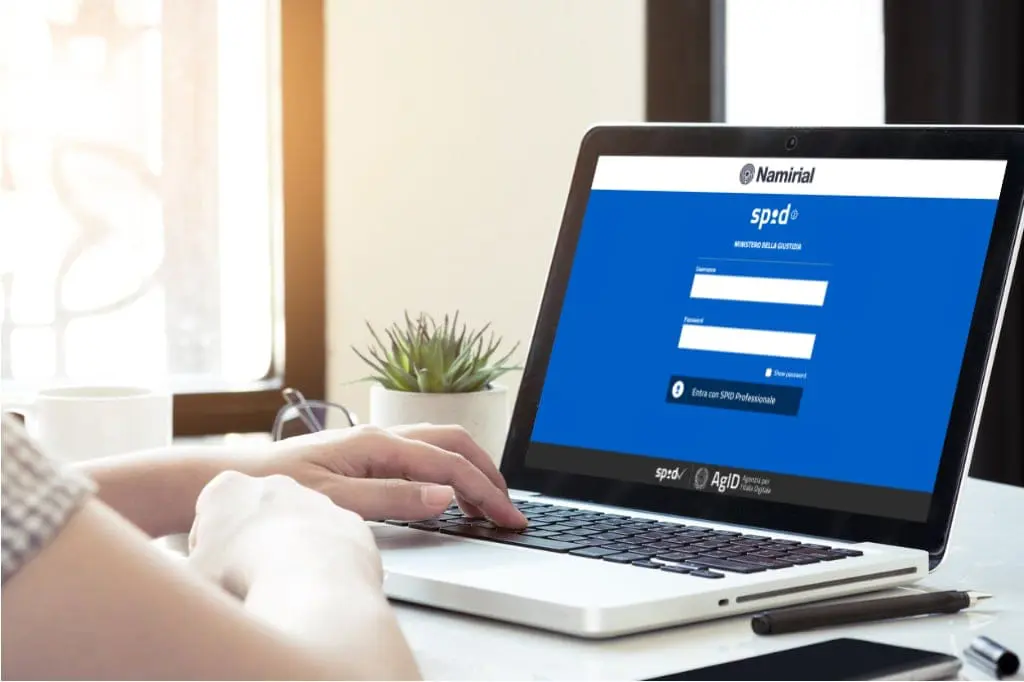 Immagine che mostra la schermata di login di SPID su un computer laptop